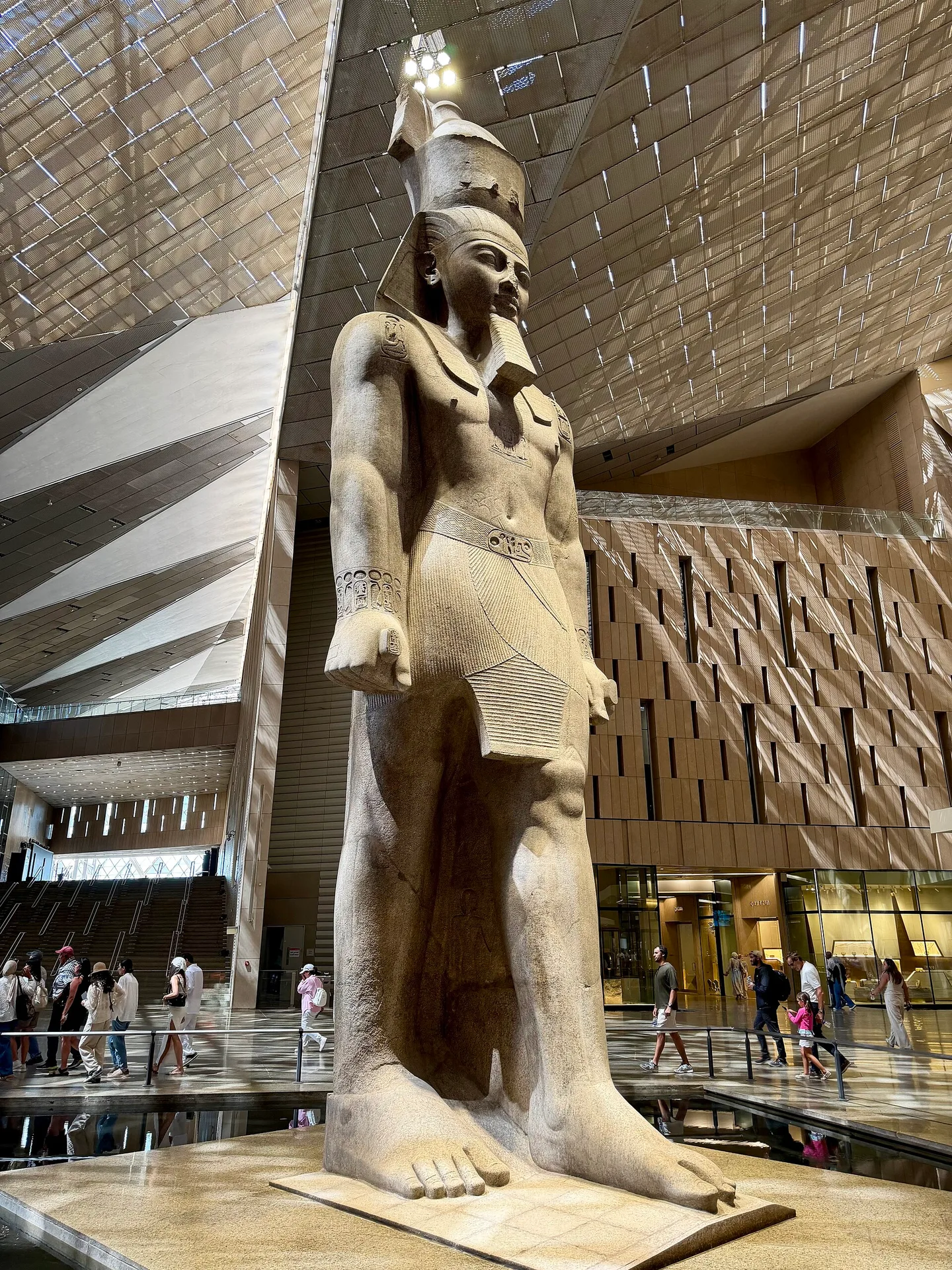Colossal granite statue of Ramesses II inside the Grand Egyptian Museum