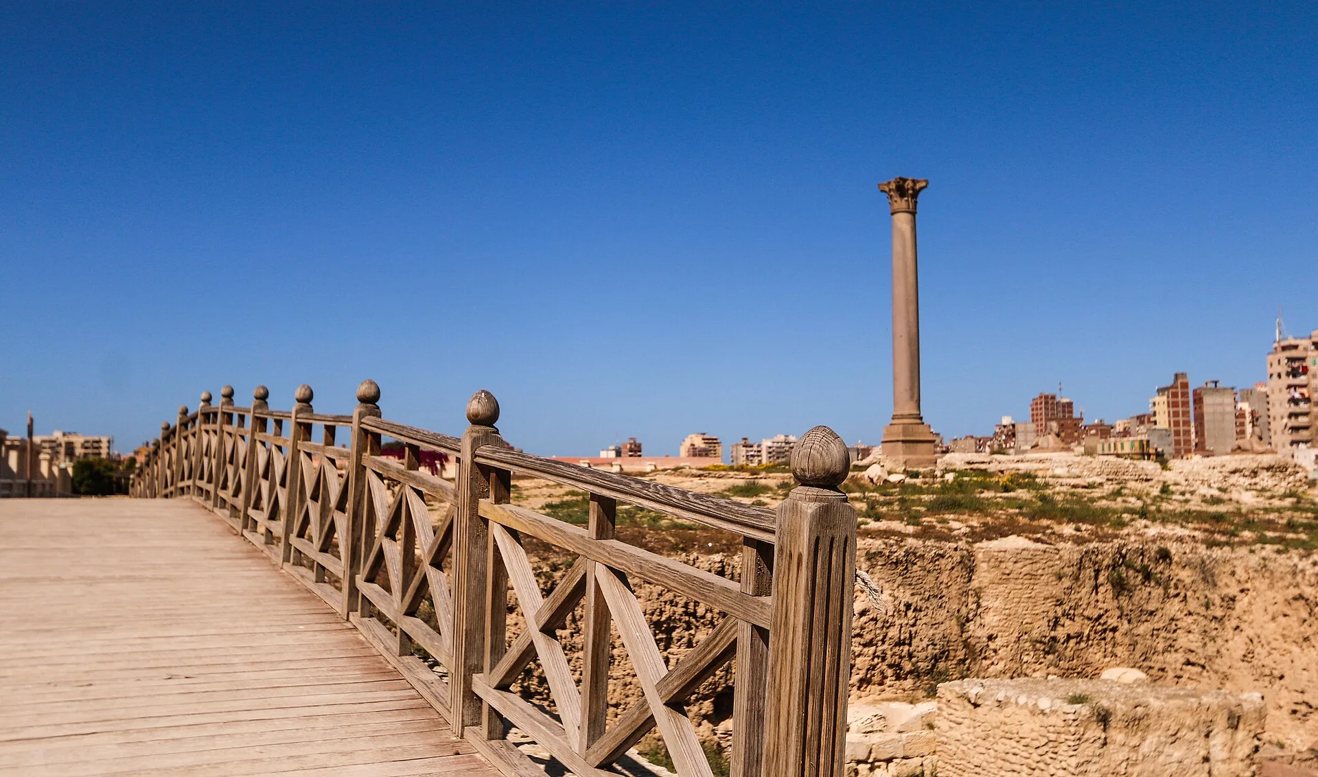 Pompey's Pillar, the Roman granite column standing above the ancient Serapeum site in Alexandria