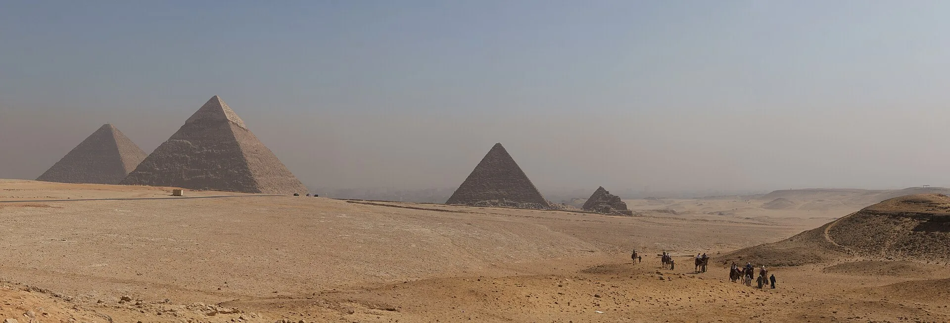 Panorama of the pyramids of Giza across the desert plateau near Cairo