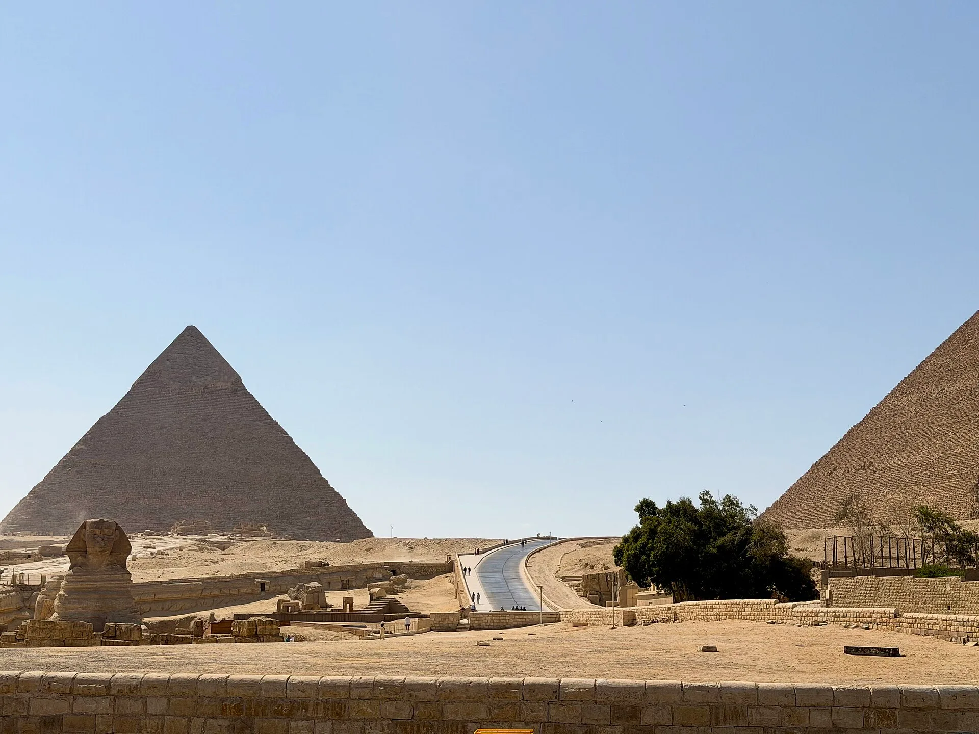 The Great Sphinx before the pyramids of Khufu and Khafre at Giza