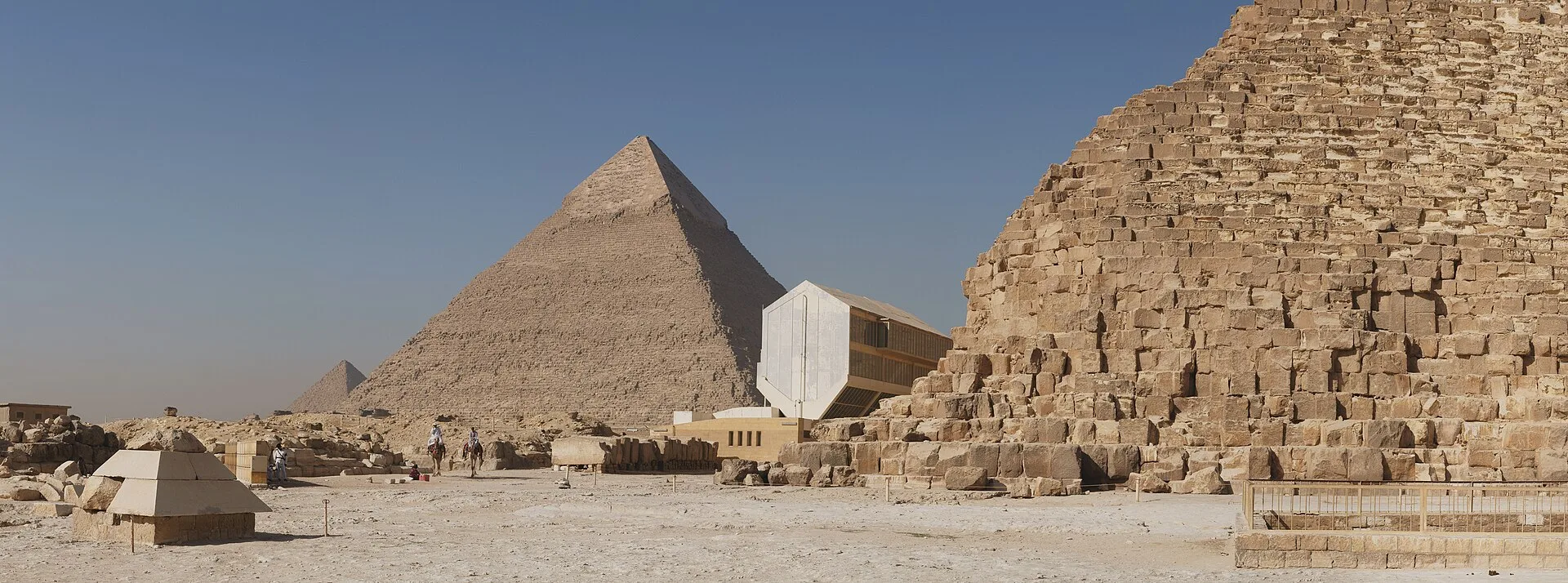 The pyramids of Giza beside the Khufu solar boat pit and museum