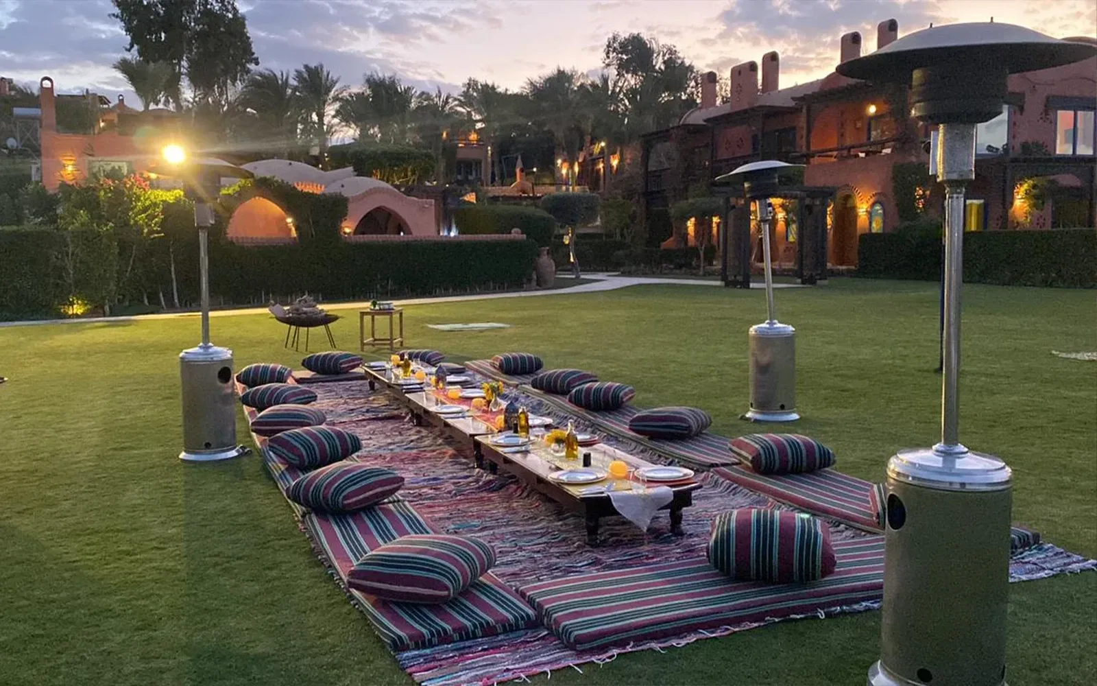 Evening dinner set up on the lawn at Lazib Inn