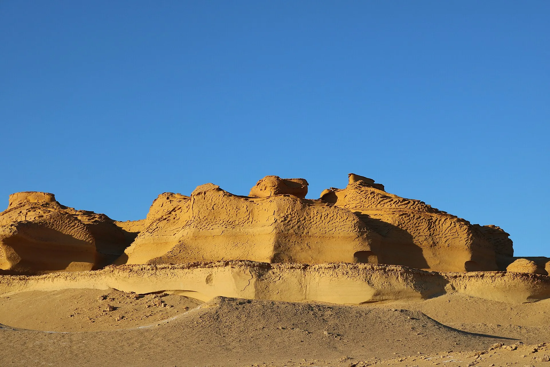 Eroded sandstone hills of Wadi Al Hitan, the Valley of the Whales