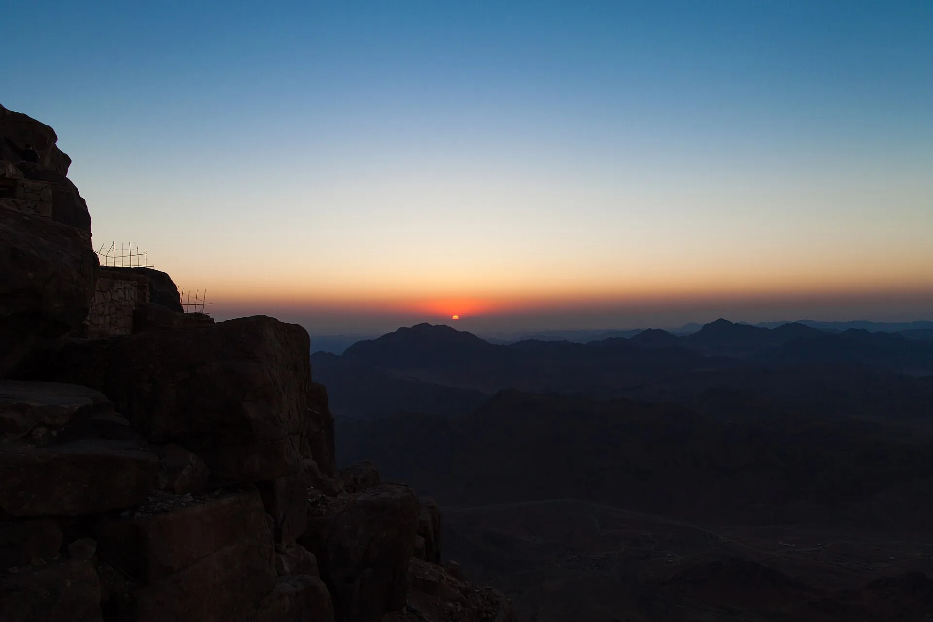 Sunrise over the rugged peaks seen from the summit of Mount Sinai