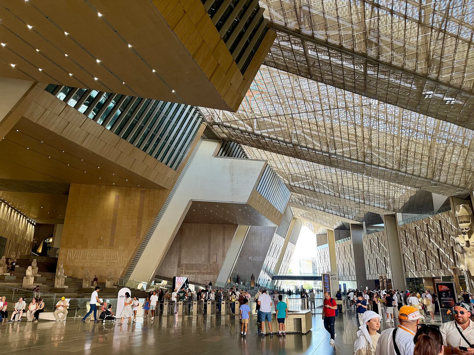 The vast Grand Hall atrium of the Grand Egyptian Museum near Giza