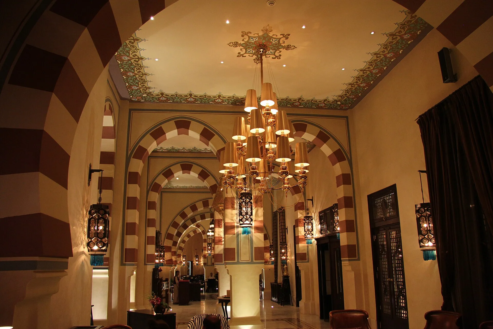 Moorish-style arched hall with chandelier inside the Old Cataract hotel