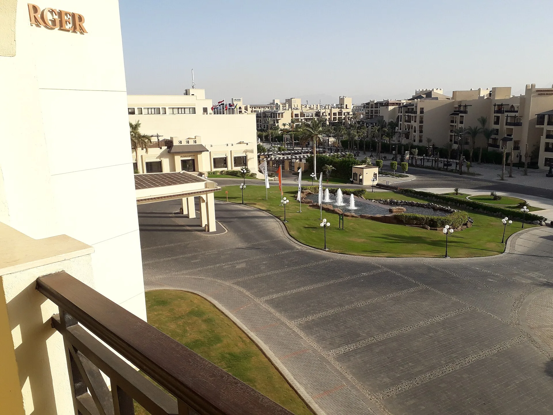 Entrance driveway and fountain of Steigenberger ALDAU Beach Hotel